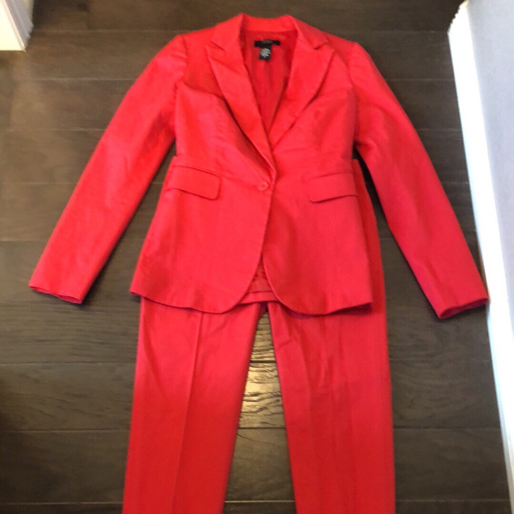 Stunning red suit by Body by Victoria